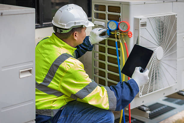 Professional Hvac Installation technician working in Satsuma, AL